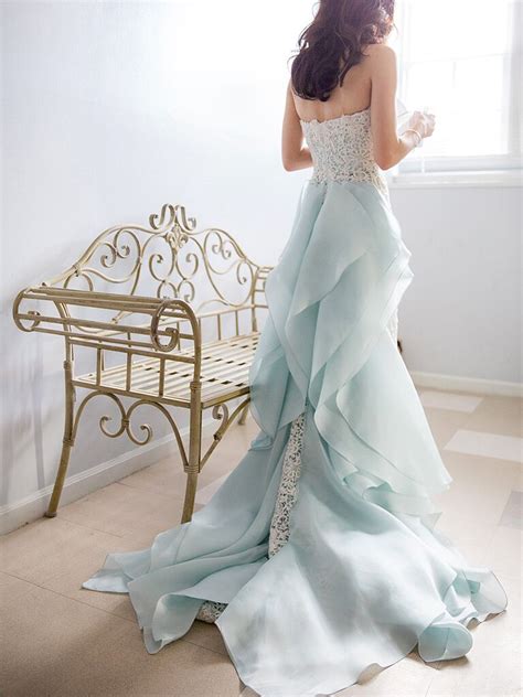 Elegant Wedding Gown with Blue Accents for the Dreamy Bride